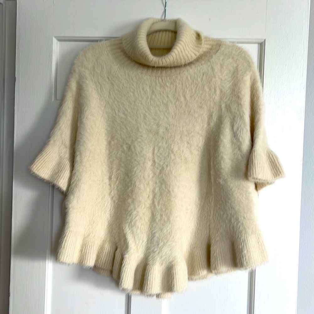 Anthropologie soft, swingy sweater.